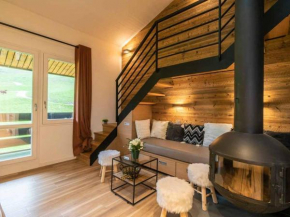 Appartement Duplex rénové avec 2 chambres, balcon et poêle à bois - FR-1-291-743